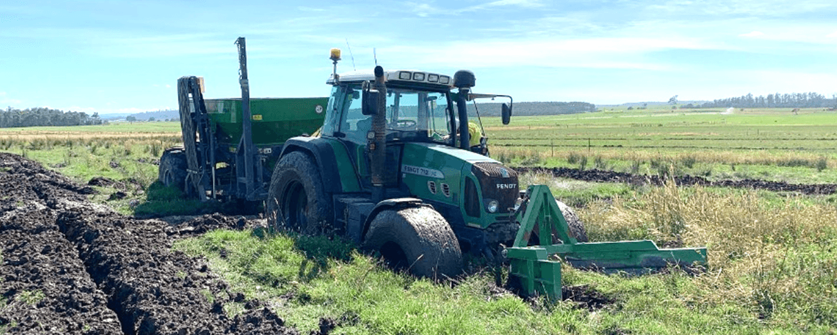 Figure 13. Drain installation when soils are wet can result in bogged machinery. (Photo by WD Drainage).