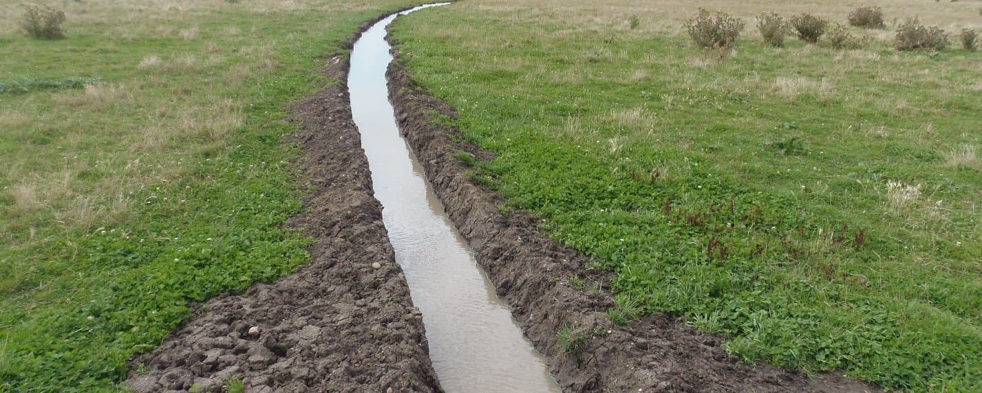 Figure 28. Water retained in a compacted centre pivot wheel rut.