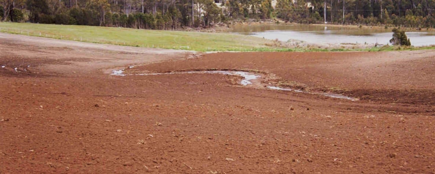 Figure 50. Soil erosion occurs in unprotected landscape depressions.